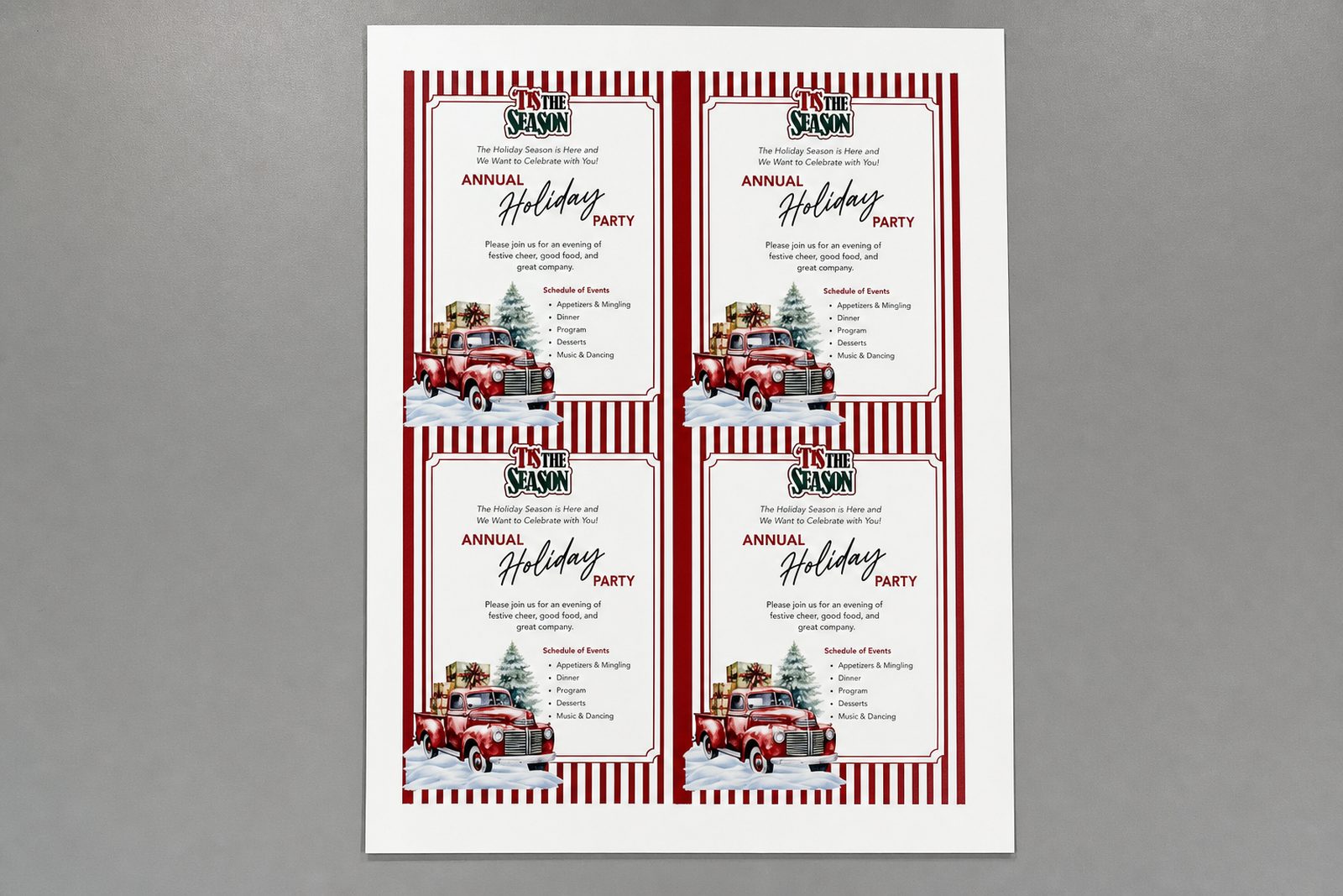 A printed sheet of four holiday party invitations with a red vintage truck and candy stripes